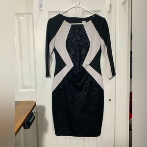 Modern geometric black and white long sleeve dress with slimming effect